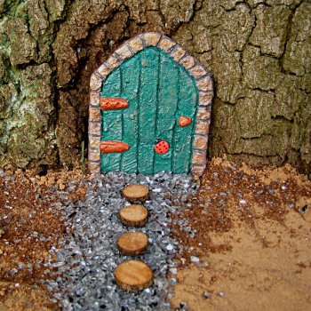 green concrete outdoor fairy door